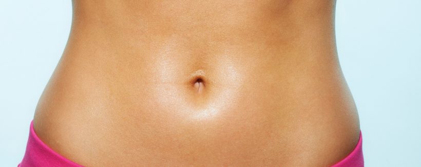 Body of young woman in workout gear